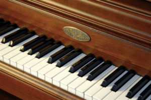 Wurlitzer Pianos | Wurlitzer Upright Piano Logo
