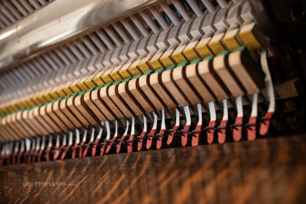 Kurtzmann Upright Piano Action Parts - Interior of restored vertical piano by Chupp's Pianos